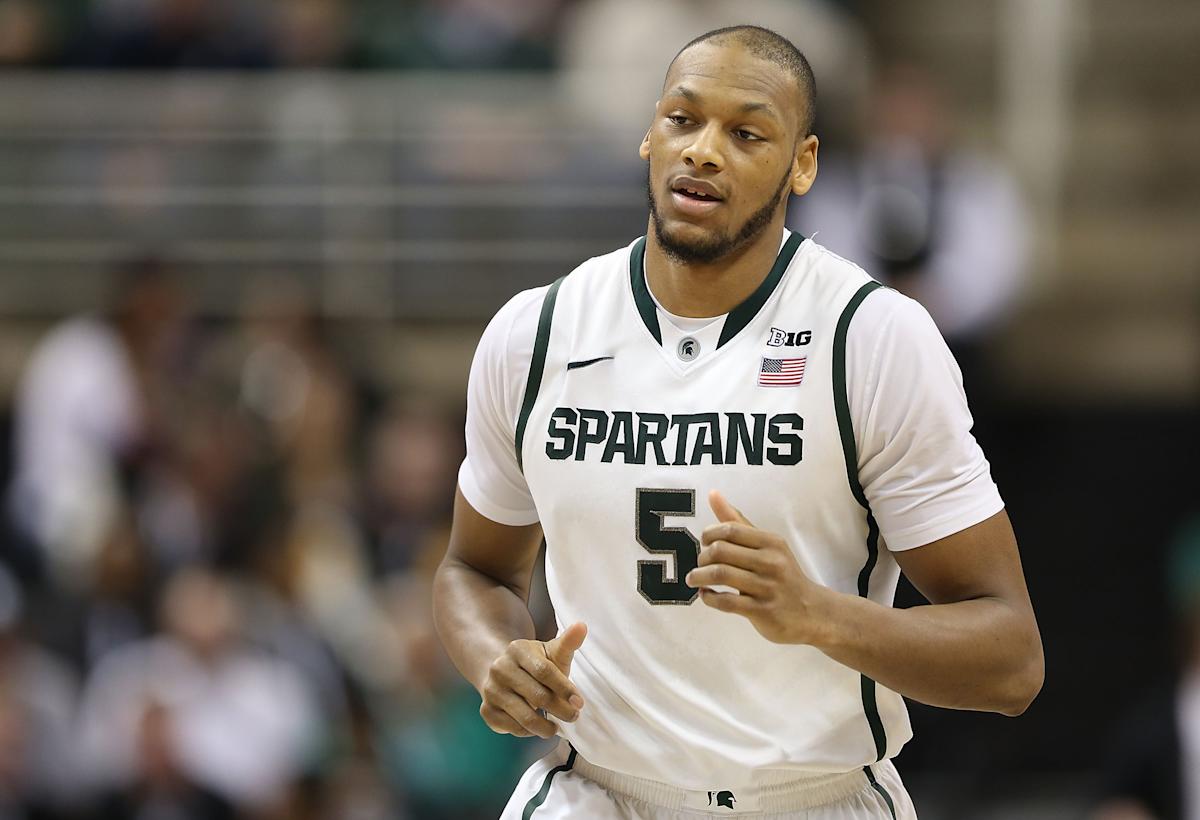 Adreian Payne killed intervening in domestic dispute;  alleged shooter pleads not guilty