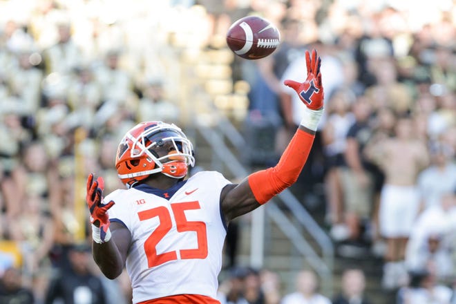 Illinois defensive back Kerby Joseph intercepts the ball in the end zone during the third quarter Sept.  25, 2021 at Ross-Ade Stadium in West Lafayette, Ind.