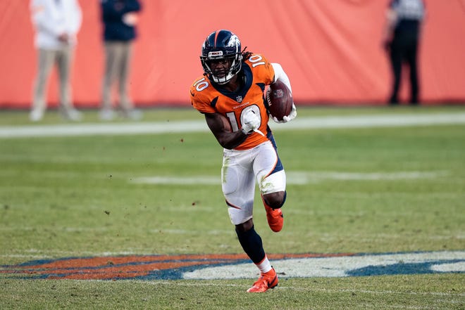 Denver Broncos wide receiver Jerry Jeudy (10) runs the ball on a reception in the fourth quarter against the Denver Broncos at Empower Field at Mile High.
