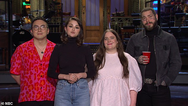 The latest: Selena Gomez, 29, was seen in a newly released clip Thursday promoting her first time hosting Saturday Night Live, along with regulars Bowen Yang, 31, and Aidy Bryant, 35, and guest musical Post Malone, 26.