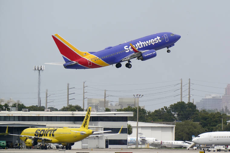 Southwest invests in faster internet, outlets and overhead bins
